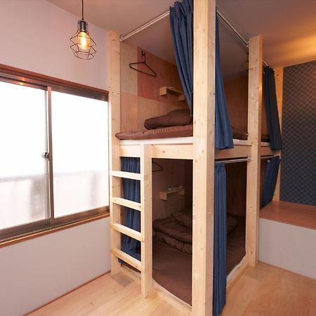 Guesthouse Oyado Sapporo Bagian luar foto