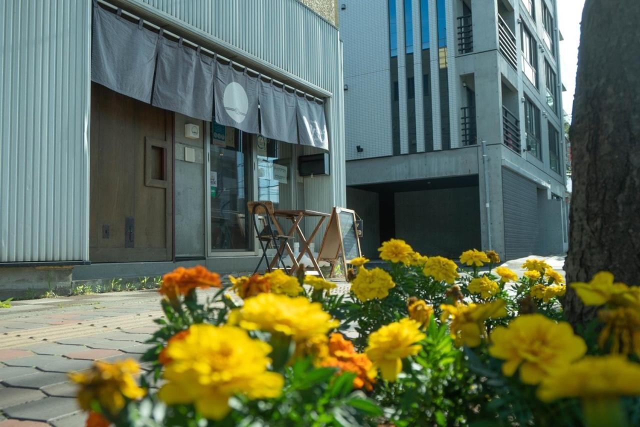 Guesthouse Oyado Sapporo Bagian luar foto