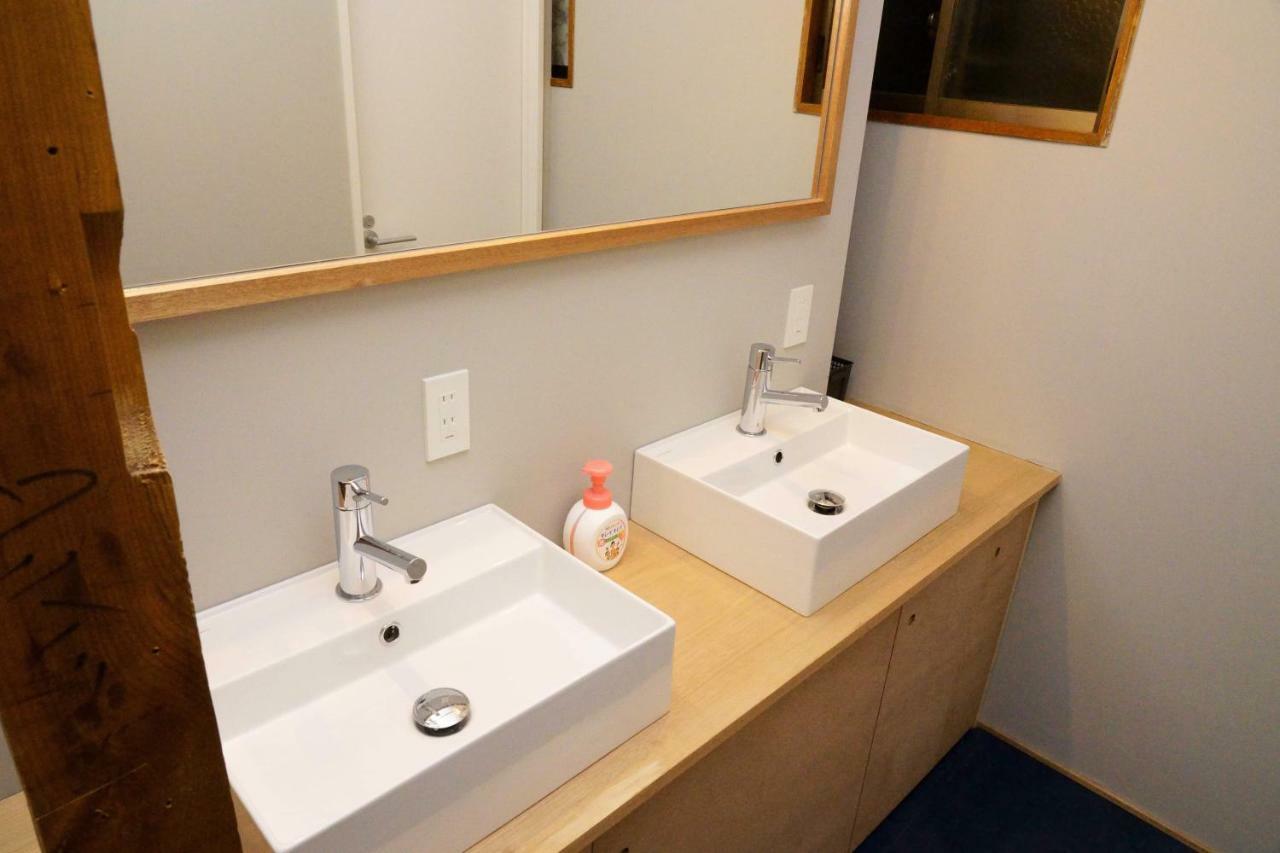Guesthouse Oyado Sapporo Bagian luar foto