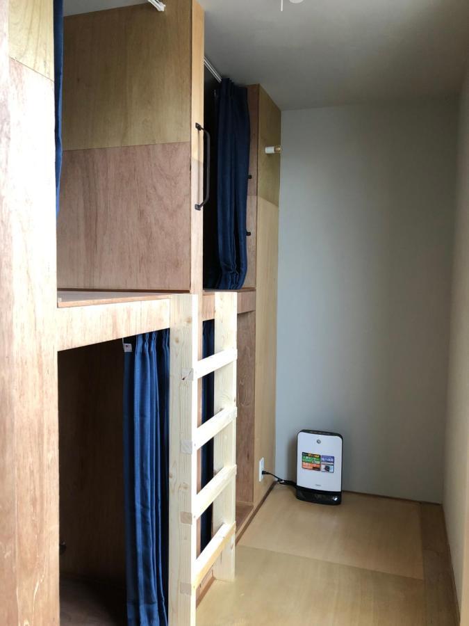 Guesthouse Oyado Sapporo Bagian luar foto
