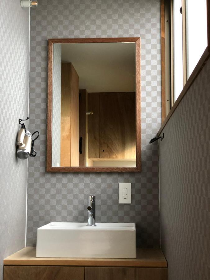 Guesthouse Oyado Sapporo Bagian luar foto